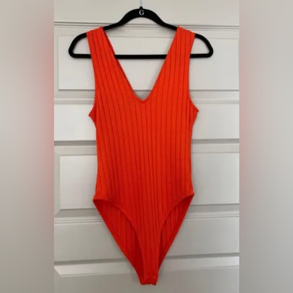 Zara body suit - vibrant orange with buttons at the bottom - Picture 1 of 4